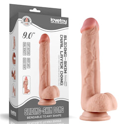 Prótese realística 23,5 cm, com camada de dupla densidade, macio por fora e interior firme, possui escroto, veias salientes e ventosa de fixação - LOVETOY